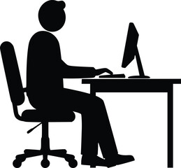 Silhouette of an office worker sitting at a desk, typing on a computer in a professional workspace