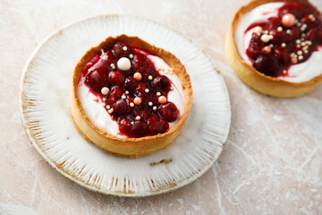 Cream cheese tarts with cherries