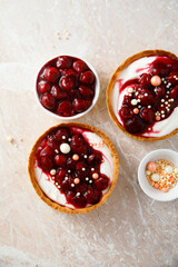 Cream cheese tarts with cherries