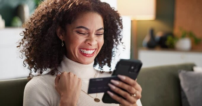 Woman, home and smile on smartphone with credit card for online shopping, discount and sale. Female person, living room and sofa with smile on mobile app or banking with rewards, voucher and savings