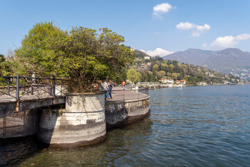 A walking path along the shore of lake Como