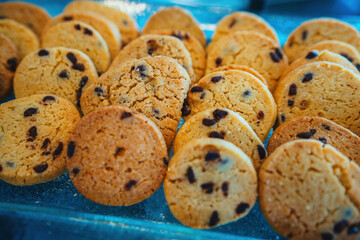 Handmade chocolate chip cookies. Cookies are lined up and waiting to be served.