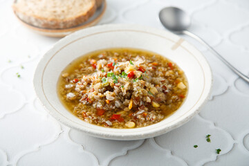 Healthy vegan lentil soup with vegetables