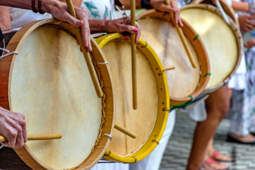 Various Wooden Drums Being Played