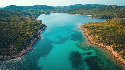 Obraz premium Aerial view secluded turquoise cove, lush hills, calm sea, boat, travel brochure