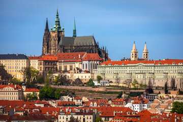 Obraz premium City Panorama of Prague, Capital of Czechia with the prominent St Vitus Cathedral on a sunny Spring Day; Copyspace
