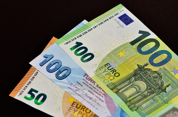 banknotes of various countries. photos of euros.