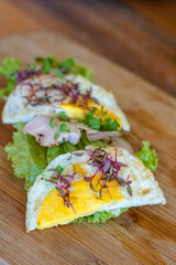 Sandwich with fried egg, and  micro greens vegetables