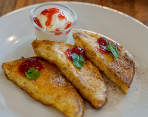 French toast with strawberry jam and ice cream