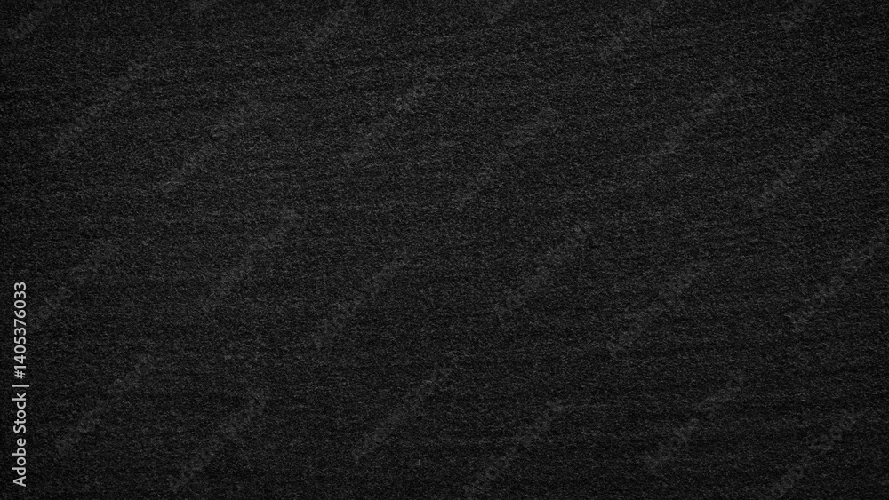 Poster A black background with no visible objects. The background is very dark and has a lot of texture