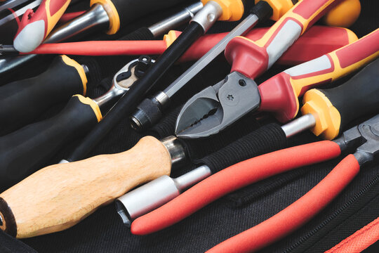 A set of various professional electrically insulated tools for electrical installation - Powered by Adobe