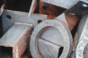 Various cut metal parts as an industrial background