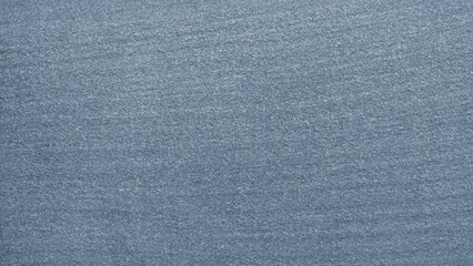 A blue  abstract texture background with a few white dots. The dots are scattered all over the background