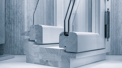 A window frame is displayed with a wooden frame and a glass frame. The wooden frame is made of wood and has a natural look.