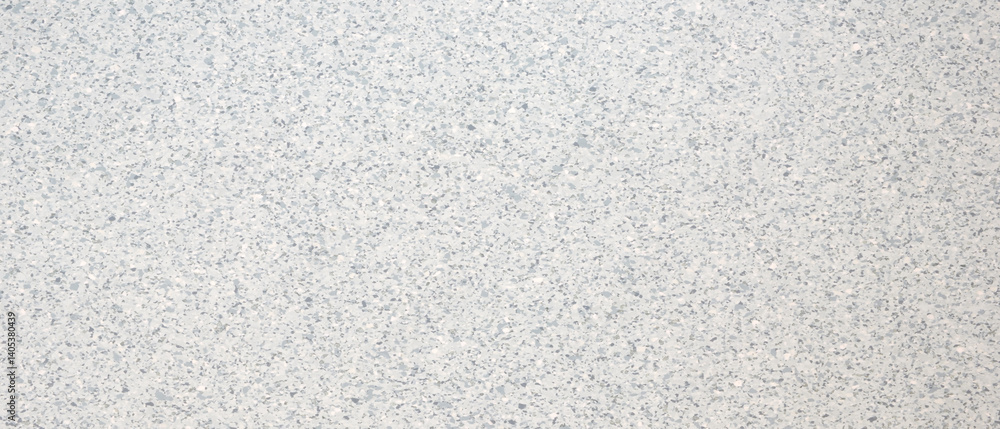Poster White wall with a pattern of small dots as an abstract textured background. The dots are evenly distributed and cover the entire wall