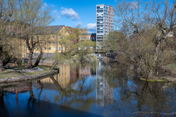 Motala Stream and the industrial landscape at Gamlebro during early spring 2025 in Norrköping. Norrköping is a historic industrial town in Sweden.