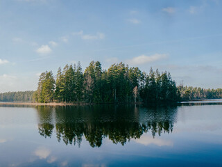 Lake in Sweden with an Island and Trees, Beautiful Reflection with high contrast