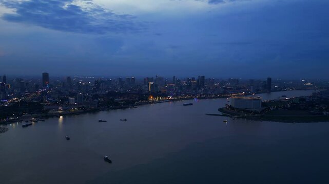 Phnom Penh khm Mekong River skyline at night. Lovely aerial view flight drone