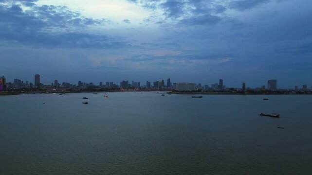 Phnom Penh khm Mekong River skyline at night. Great aerial view flight drone