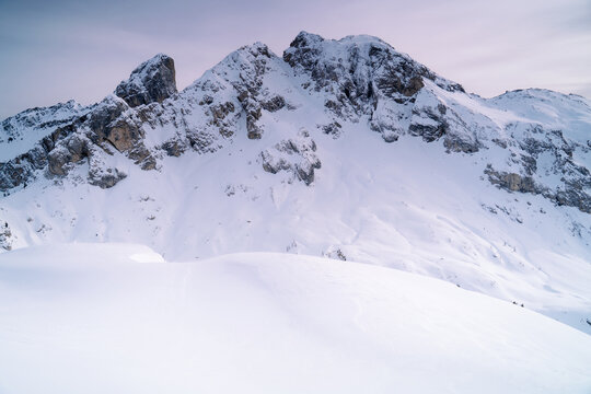 Snow capped high mountain peaks. winter in the dolomites alps. italy, europe. Passo Giau.