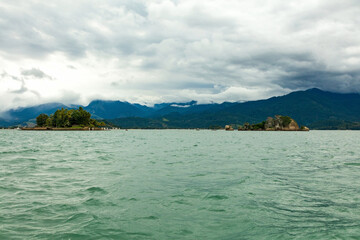 Obraz premium Islands in Paraty Bay, a tourist city and World Heritage Site in Rio de Janeiro, Brazil