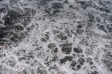 Stormy sea foamy waves background