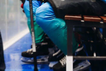 Hockey match game on ice rink arena stadium, team of ice hockey professional players with coach,...