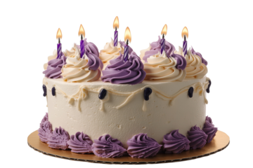 Festive cake with creamy icing and purple accents, topped with burning candles on a golden stand. Sweet treat, perfect for celebrations