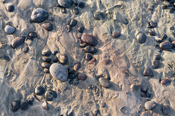 pebbles on the beach at sunset, pebbles background