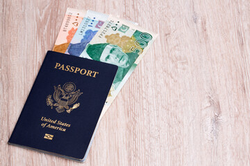 American passport with  Pakistani Rupee