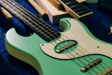 Obraz premium Crafting precision: inside a bass guitar luthier workshop