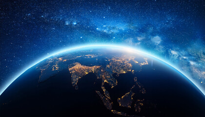 Fototapeta premium a darkened globe with illuminated continents glowing softly under a starry sky symbolizing earth hour awareness