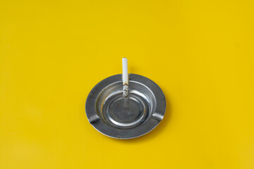 Cigarette ashtray and cigarette ash
