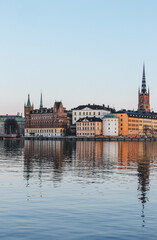 Naklejka premium panorama of stockholm sweden with water reflections on canals