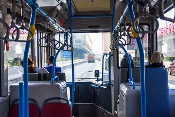 Inside View of Bus in Traffic with Highway and People View