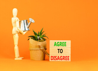 Agree to disagree symbol. Concept words Agree to disagree on beautiful wooden block. Businessman...