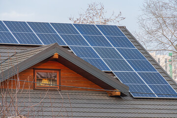 Fototapeta premium Image of a wooden, solar-powered residential building in a suburbanrural setting, showcasing sustainable living and eco-friendly aesthetics