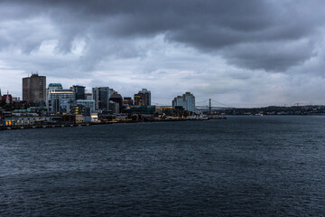 Image of Halifax Nova Scotia Canada Skyline cityscape on overcast evening photo take from middle of harbor.