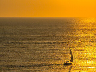Sunset in a bay with lots of sea on a vacation trip