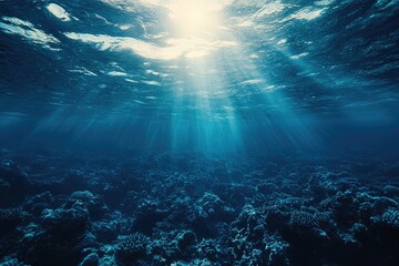 Fototapeta premium Sun rays filter into underwater ocean scene with coral reefs and light refraction
