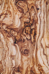 Close up sur une texture de bois avec des noeuds - Arrière plan design brun avec des courbes et formes abstraites