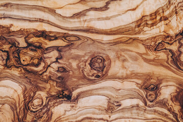 Close up sur une texture de bois avec des noeuds - Arrière plan design brun avec des courbes et formes abstraites