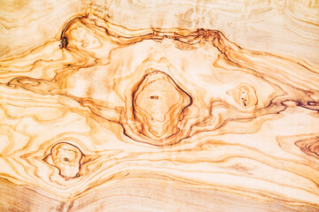 Close up sur une texture de bois avec des noeuds - Arrière plan design brun avec des courbes et formes abstraites