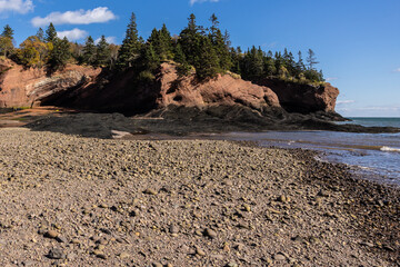Famous sandstone cliffs at St Martins sea caves at low tide, Bay of Fundy, New Brunswick, Canada