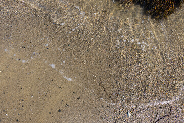 Shoreline sandy beach close up texture photograph coastal themed stock image