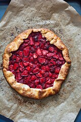 French dessert Galette with shortbread and strawberries. Open pie with berries.	