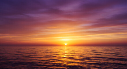 Obraz premium Stunning coastal sunset with glowing clouds and vivid ocean reflections — perfect for travel, nature, relaxation, and inspirational visuals in both print and digital use.