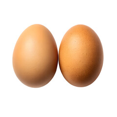 Two brown eggs close up, isolated on black background.