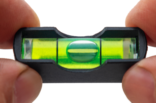 close up of fingers holding small green bubble level trying to find balance position, Macro, Cut out