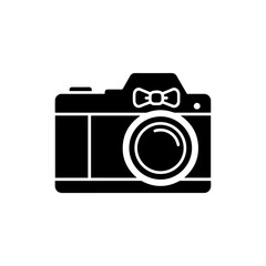 Vintage Camera with Bow Tie Symbolizing Preserving Memories on Father’s Day